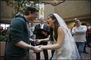 Jax and Heather Collins get married at the Salt Lake County clerk's office.