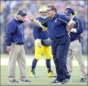 University of Michigan head coach Brady Hoke yells to his players during the fourth quarter of their football game against Ohio State University last month.