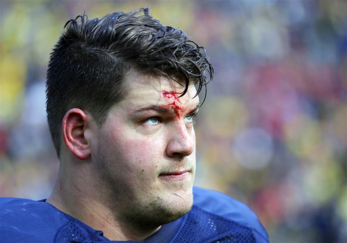 Michigan's Taylor Lewan apologizes for facemask twist against Spartans 