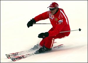 Formula One driver Michael Schumacher of Germany speeds down a course in the Madonna di Campiglio ski resort, in the Italian Alps in 2006.