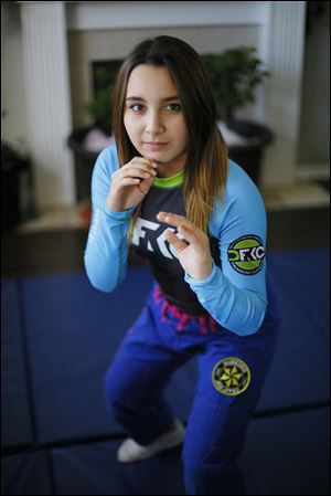 Perrysburg High School student Chloey Sniecinski, 14, has found her passion in jiu jitsu. One day, she would like to open her own gym and teach girls like her how to defend themselves.