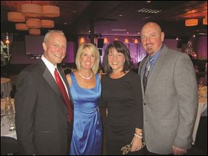 From left, Joe and Dana Metzger and Laura and Roger Sheahan at St. Francis de Sales’ An Elegant Knight.