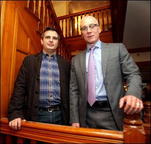 New Hampshire Republican Congressional candidate Dan Innis, right, poses with his partner Doug Palardy, in Portsmouth, N.H. 