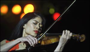 Internationally renown  violinist Vanessa Mae as she performs during her concert in Prague, Czech Republic in 2010.