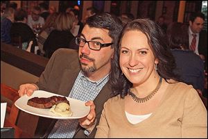 Wyatt and Stephanie Holliday enjoying Table Forty4 meatloaf.