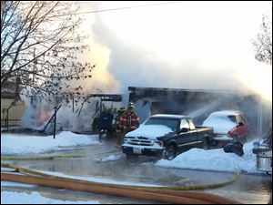 Northwood fire crews battle a blaze in the 900 block of Gould Street early today.