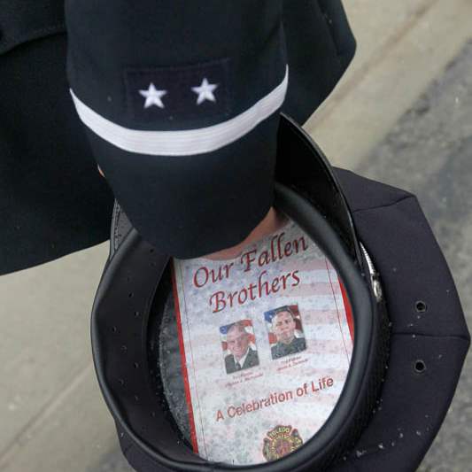 Station-5-Toledo-firefighter-Lt-Tom-Bartley-holds-his-hat-as-h