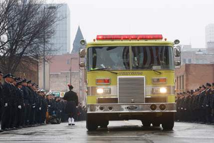 Perrysburg-firefighters-ride-in-the-p