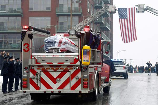 Toledo-Firefighters-salute-as-the-casket-of-Toledo-Firefighter-Stephen-Machcinski