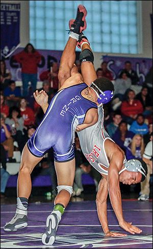 Fremont Ross' Trey Grine beat Central’s Richard Jackson at 145 pounds.