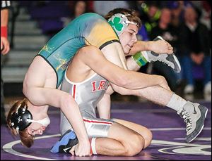 Central Catholic's Nate Hagan, top, defeated Clay's Richie Screptock 3-1 in the 132-pound championship.