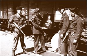 The Monuments Men guard the ‘Lady with Anermine,’ one of the artworks saved after WWII. 