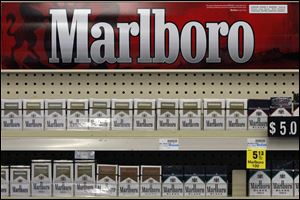 Marlboro cigarettes are on display in a CVS store in Pittsburgh.