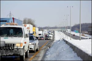 The southbound lanes of I-75 are backed up near Buck Road as the northbound side remains clear.