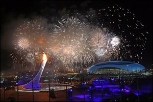 Fireworks light the sky over Olympic Park during Friday’s opening ceremony of the Winter Olympics in Sochi, Russia.  It was proclaimed the ‘most complex and ambitious technical show ever attempted in Olympic history.’ 