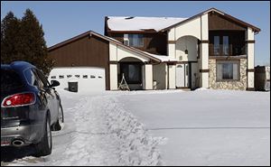 A relative of the Garza family discovered the four bodies Thursday night at this house on Bowman Road in Highland Township. Authorities believe the weapon used — described as a ‘hand-held gun’ — was found at the scene.