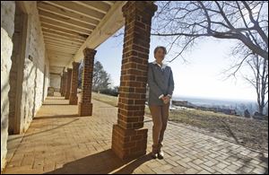 Leslie Greene Bowman president and CEO of the Thomas Jefferson foundation, poses along the south terrace near the kitchen of Thomas Jefferson's Monticello  in Charlottesville, Va.