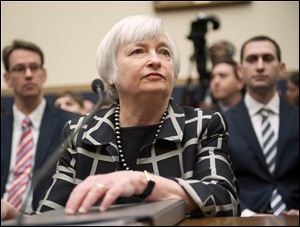 Federal Reserve Chair Janet Yellen listens on Capitol Hill in Washington today while testifying before the House Financial Services Committee hearing. 