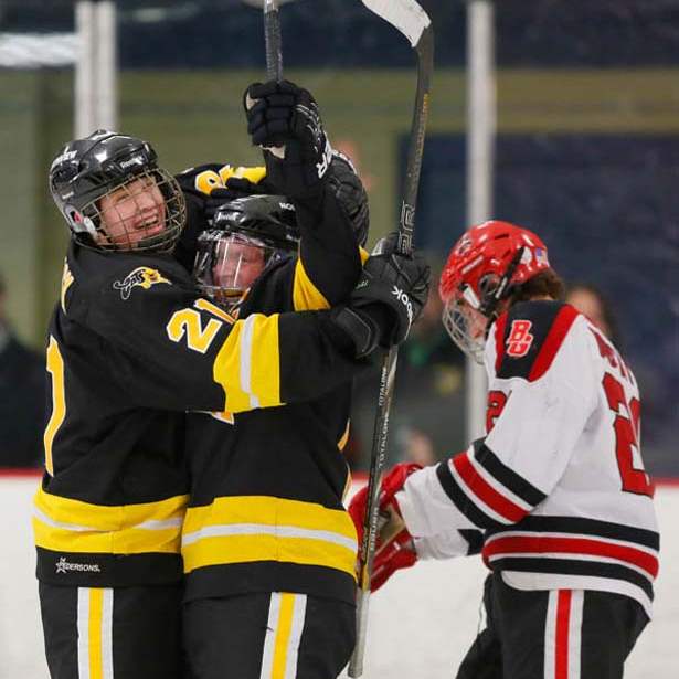 Districthockey23p-koback-and-estrel-celebrate