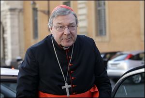 Australian Cardinal George Pell was named prefect of the new economics secretariat today.