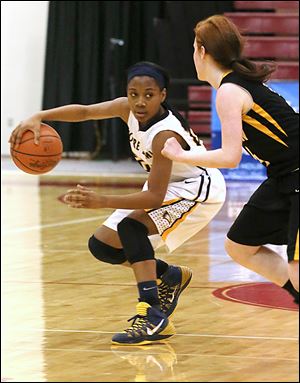 Notre Dame ’s Christianna Jefferson, left, dribbles in front of Northview’s Maddie Fries. Jefferson scored 10 points in the Eagles’ win.