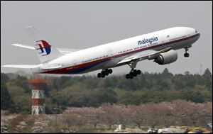 A Malaysia Airlines Boeing 777-200ER at Narita Airport in Narita, near Tokyo, on April, 2013.