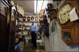 Franz Fulkerson, above, and his father Frank are there when the yearly effort to move clocks forward in the spring leads to a rash of service calls to Fulkerson Jewelers & Clock Shop in Toledo. 