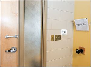 Each classroom now has a bolt to secure the door. Adjacent to the door is the new Lexan panel that has replaced the clear glass sidelight in each classroom. 