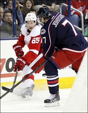 The Red Wings’ Danny DeKeyser, left, scored the lone goal for the slumping Red Wings, who have won just once in their last five contests.