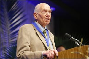 Jefferson Award winner Jay Mirrow speaks during the annual Jefferson Awards breakfast. He developed a mentoring program and plan to promote literacy in Toledo Public Schools.