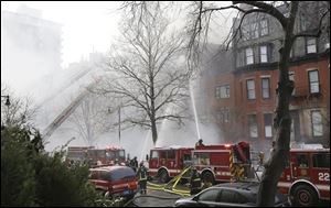 Fighters battle a multi-alarm fire.