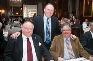 DAVE DEPASSE, left, ART BRONSON, event chairman, center, and RICH ROTHROCK at the Toledo Club Scotch Night.