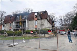 No one was reported to be injured in the early morning fire at the apartment building at 4902 Secor Rd. The Red Cross is helping 21 families find temporary shelter. 