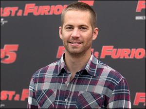 Paul Walker poses during the photo call of the movie 