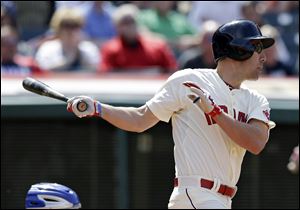 The Indians' David Murphy hits a three-RBI double off Toronto Blue Jays relief pitcher Aaron Loup in the sixth inning Sunday in Cleveland. Carlos Santana, Michael Brantley, and Asdrubal Cabrera scored.