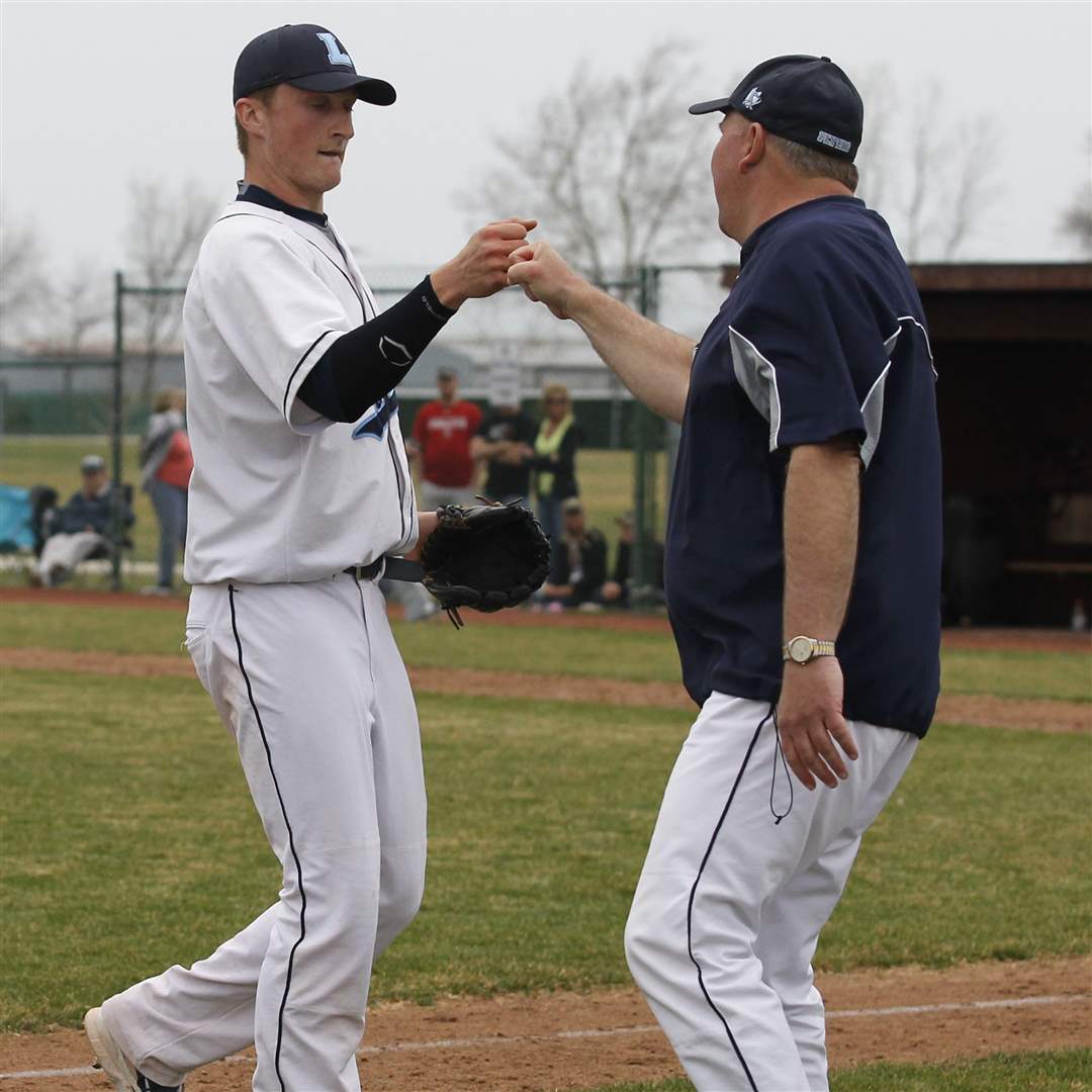 Jayce-Vancena-is-fist-bumped-by-Lake-head