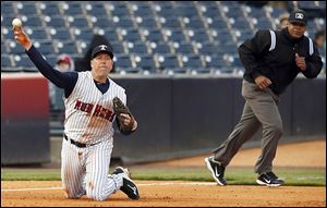 Mud Hens third baseman Mike Hessman makes a play during the fourth inning on Thursday night against Indianapolis.