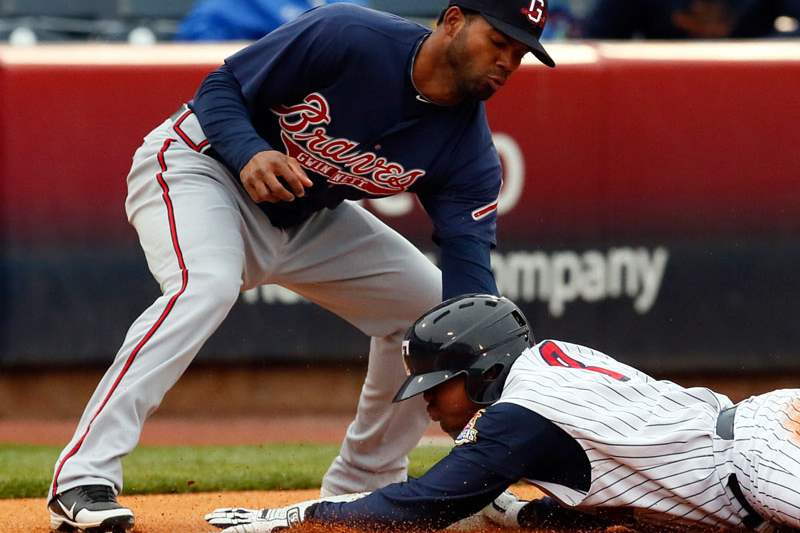 Toledo-Mud-Hens-RF-Ezequiel-Carrera-steals-third-base-against-Gwinnett-s-Edward-Salcedo-during-the-first-inning