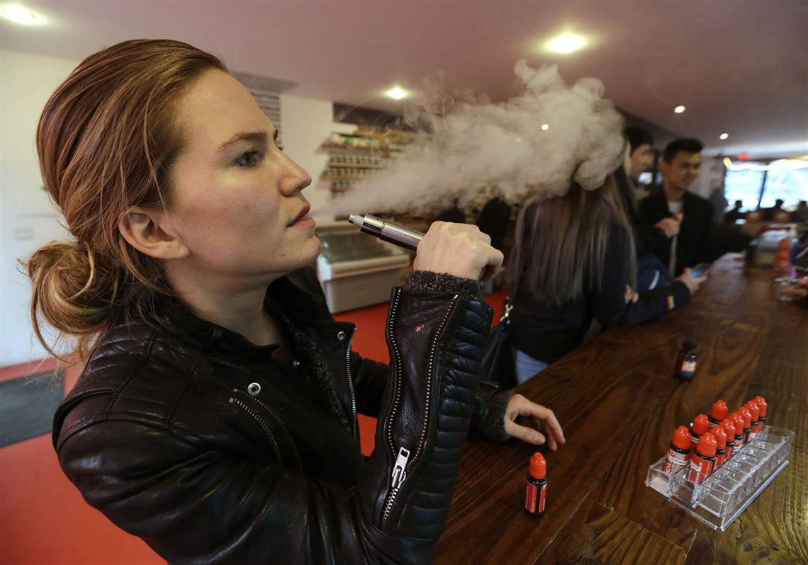 Users bemoan e cigarette bans in NYC Chicago The Blade