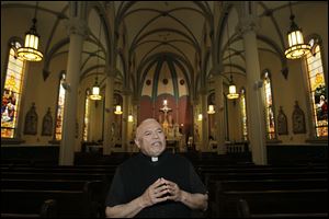 The Rev. Juan Francisco Molina speaks at Sts. Peter and Paul Church in Toledo.