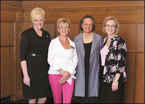 From left Chrys Peterson, Komen board president Teresa McHugh, Komen scholar Dr. Lori Pierce, and executive director Mary Westphal at the Northwest Ohio Susan G. Komen luncheon.