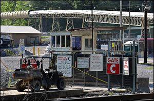 The entrance gate to Brody Mine No. 1 in Wharton, W.Va., is closed after two men were trapped and killed Monday by a collapse believed to have been caused  by ‘retreat mining,’ the most dangerous mining process.