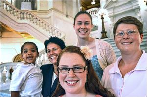 From left, Landon, Susan,  Abbey, Katie, and Deb Whitewood led the lawsuit that was filed in July to strike down Pennsylvania’s ban on same-sex marriage. Altogether, 11 gay couples, two teenagers, and a widow were part of the lawsuit. Many now plan to get married.