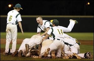 Start players celebrate defeating Bowsher 2-0 in  the City League baseball championship game.