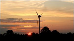 Development of alternative energy sources, such as this wind turbine west of Bowling Green, could stall if SB 310 becomes law.