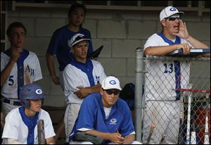 Anthony Wayne pitcher Mason Zimmerman (23), right, cheers from the dug out during a game.