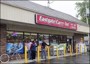 The Eastgate Carry Out store was robbed on Tuesday, the 12th carryout burglary in Toledo since May 1. Police have not released descriptions of the suspects, nor images from surveillance video.