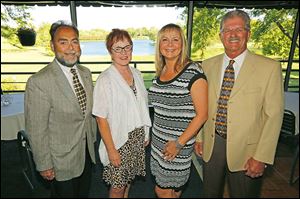 From left; Steve Cotner, Debby Peters, Jeri Wendt and Jerry O'Kenka, at the Perrysburg Rotary 35th charter night celebration at Belmont Country Club.