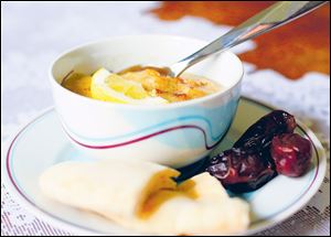 Harira, soup with chick peas, served with pita bread and dates.