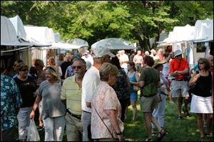 The Crosby Festival and fine weather bring a large number of people out on Saturday morning.